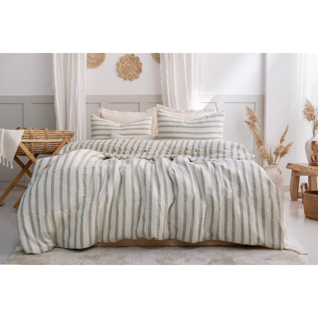 Organic GOTS certified muslin duvet cover on bed with matching pillowcases