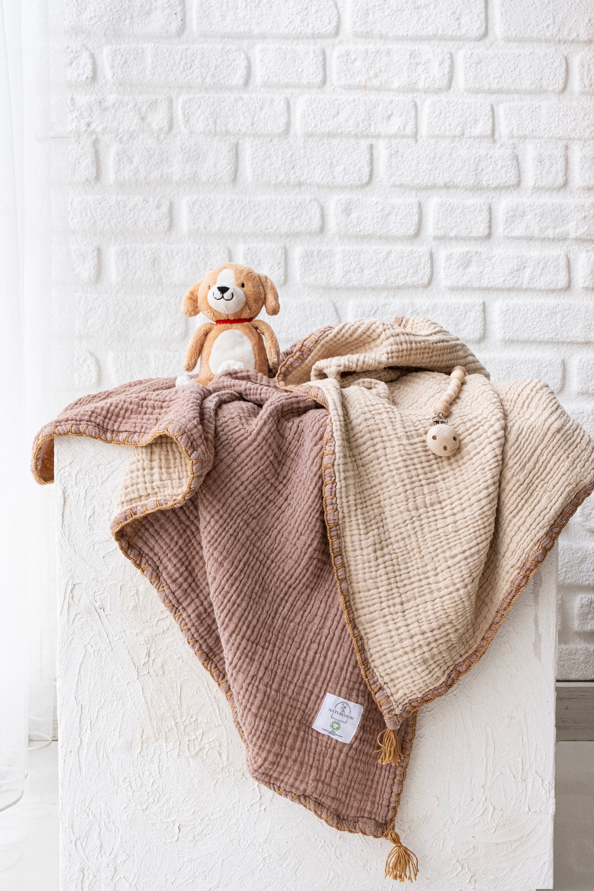 Hand-stitched edge organic baby blanket