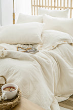 Soft ivory muslin bedding