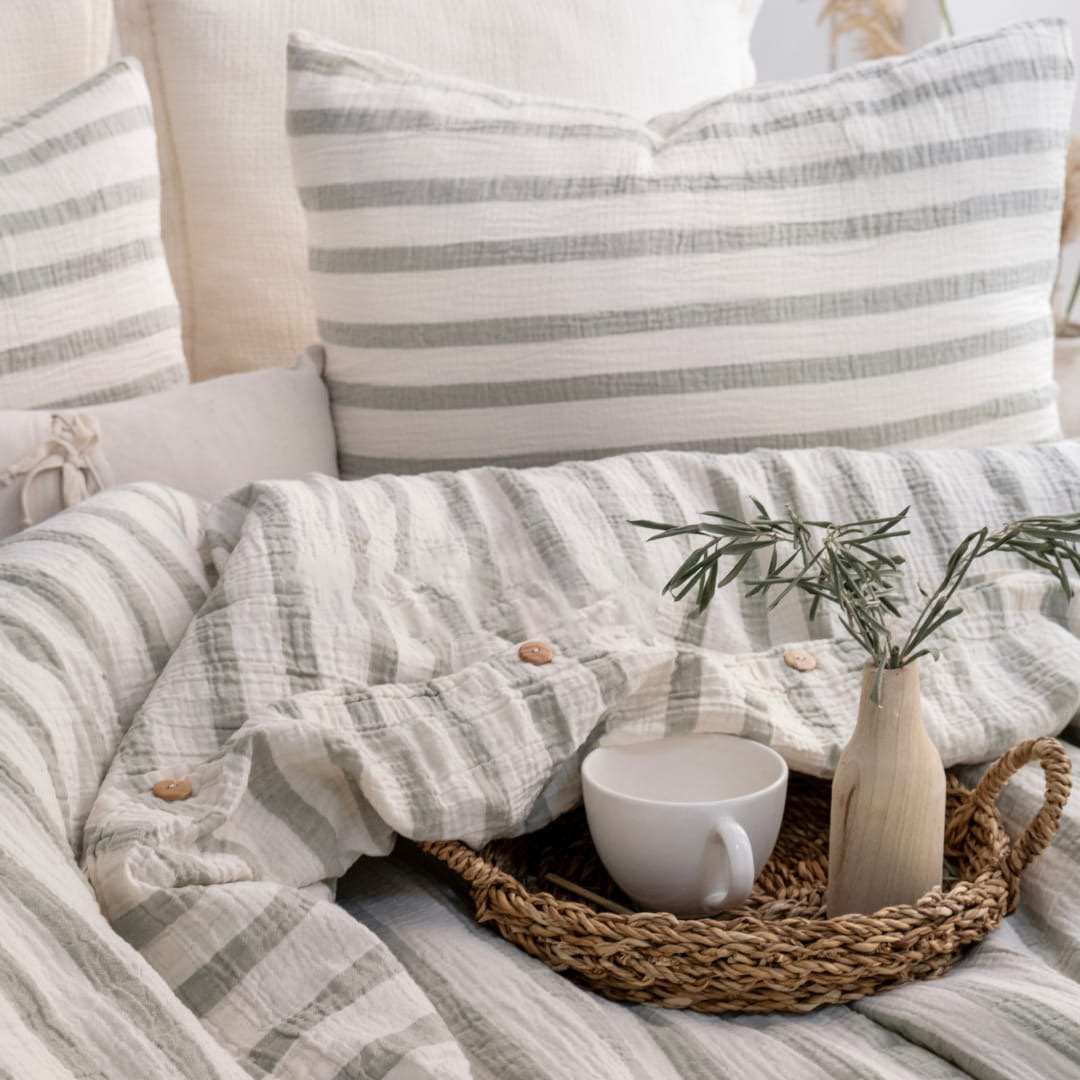 Organic GOTS certified muslin duvet cover folded on king size bed